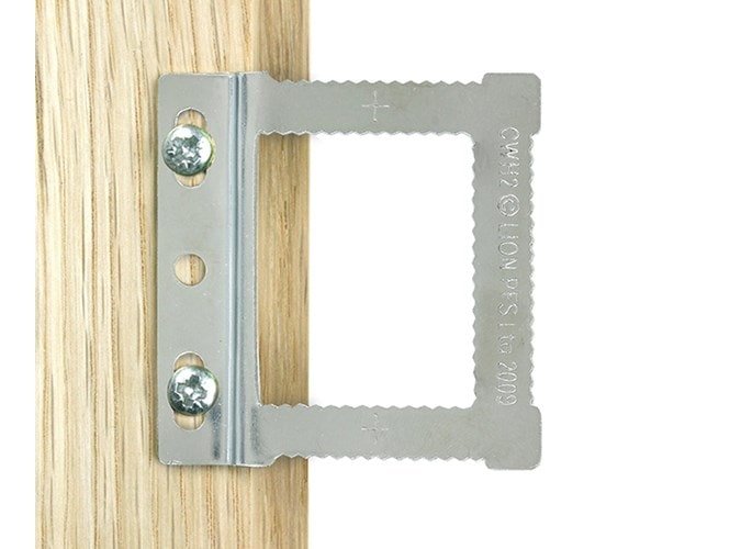 sawtooth picture hanger fitted to a frame